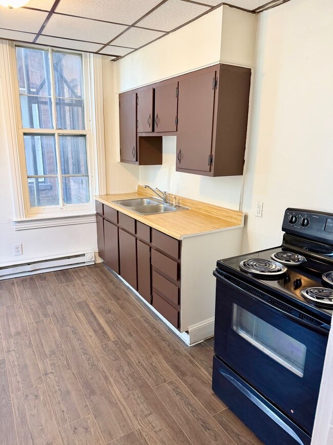 Photo - 2 Bedroom, 1 Bath First-Floor Apartment with Balcony & Private Entrance