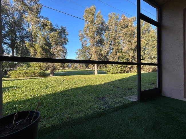 Building Photo - 10325 NW 11th St Unit 101