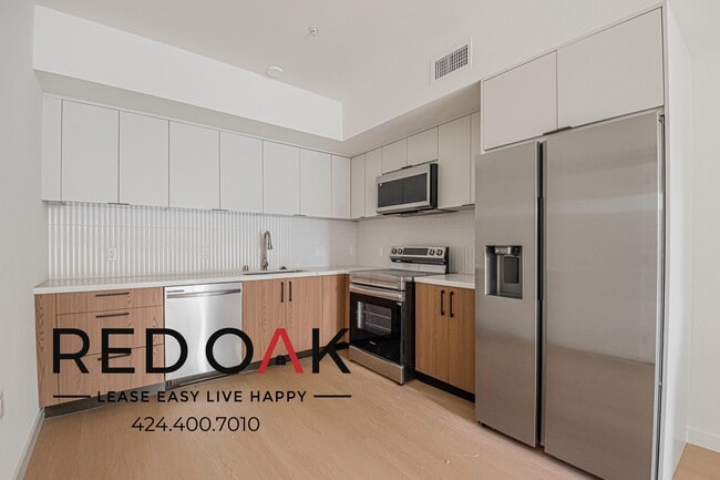 Building Photo - 856 S Gramercy Dr Unit 104