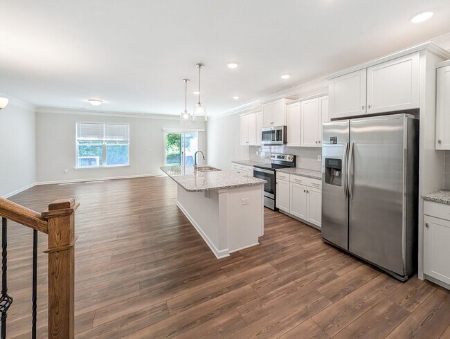 Photo - Spacious 3 Bed / 2.5 Bath Townhouse with Loft & 1-Car Garage