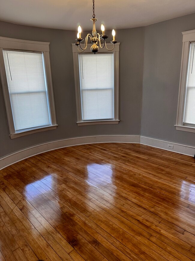 Bedroom 1 with chandelier - 16 Hillside St