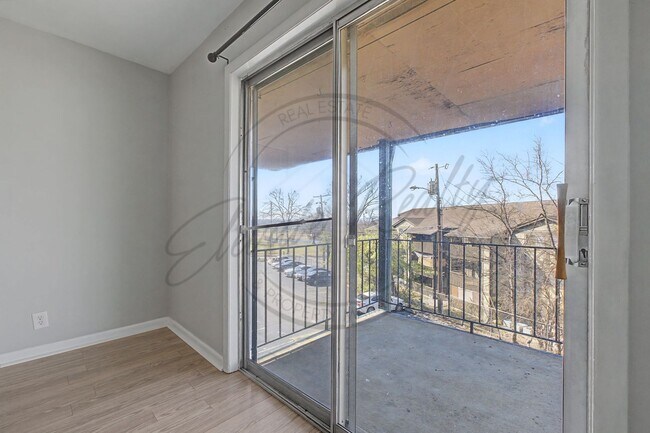 Photo - Two Bedroom Condo, 2nd Floor, across from Madison Park with stackable washer/dryer! Unit B-38