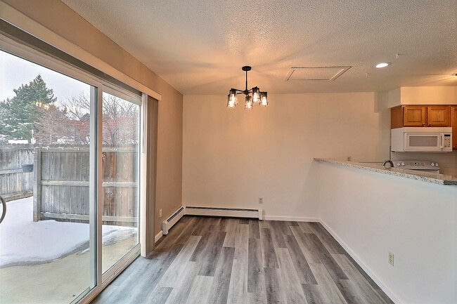 Dining Room with Patio Access - 919 44th Avenue Ct Unit C
