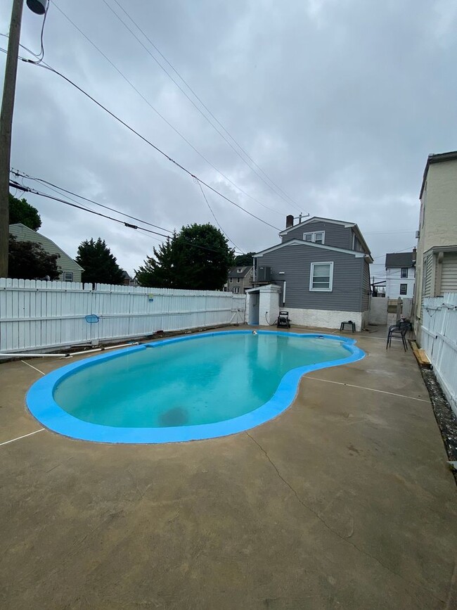 Photo - Beautiful three bed, 1.5 bath single-family home for rent with inground pool