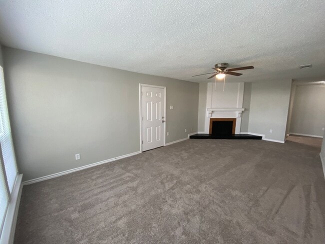Photo - Charming Unit with Vaulted Ceilings & Fire...