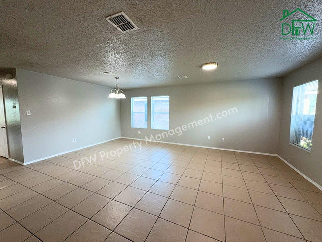 Photo - Spacious 4-Bedroom Home with Fireplace & Large Backyard in SW Fort Worth