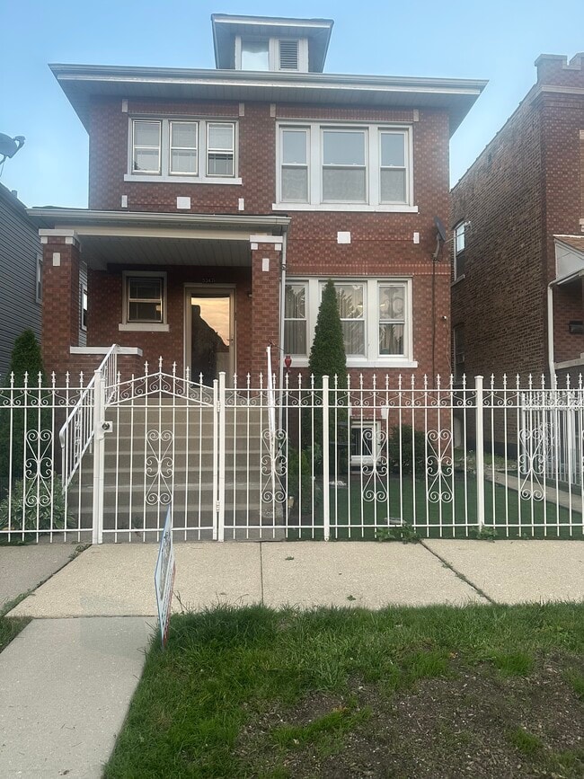 Building Photo - 5347 S Fairfield Ave Unit 2