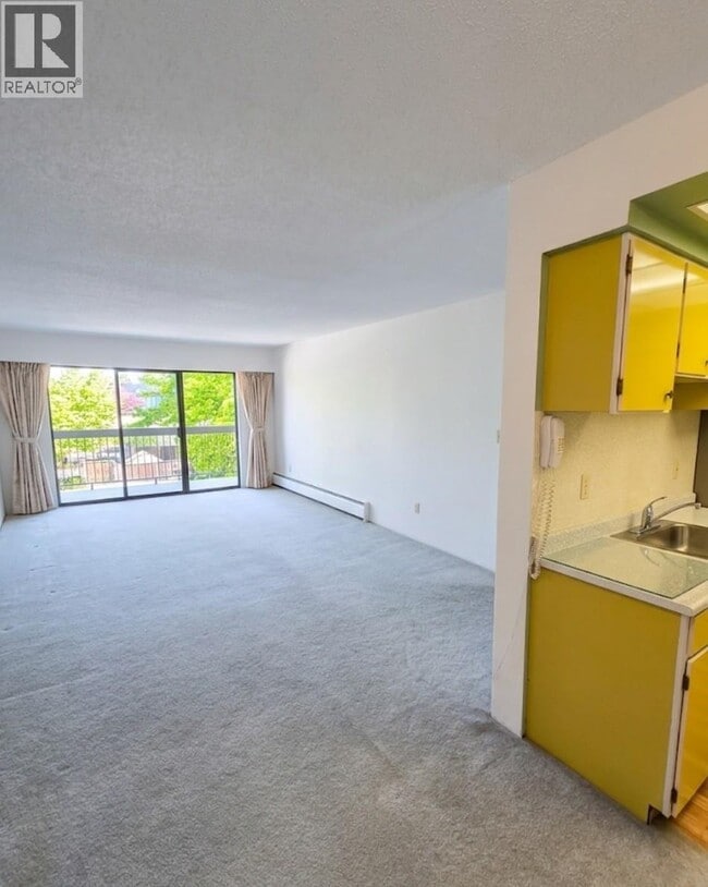 Photo - 6560 Buswell St Unit 206