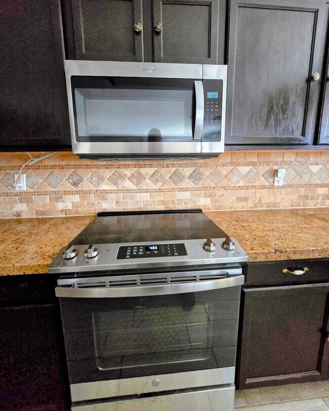 Photo - STUNNING 4 Bed, 2.5 Bath Oasis with Pool Your Dream Home Awaits!