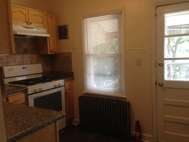 Photo - Great Home! 4 Bedroom House with Spacious Living Area! Full Basement for Storage! W/D Hook-ups! Y...