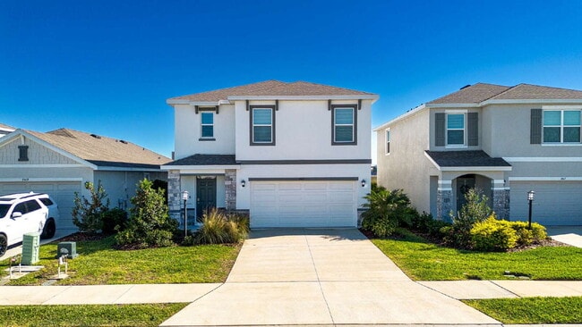 Building Photo - Spacious 5-Bed Retreat with Granite Elegance in Lakewood Ranch