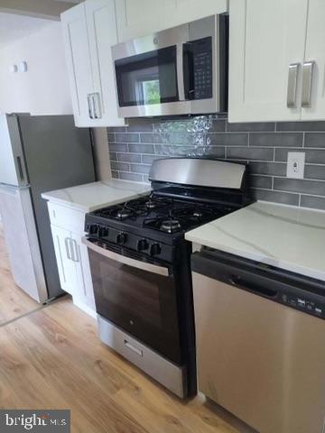 Building Photo - 100 E Holly Unit 2M