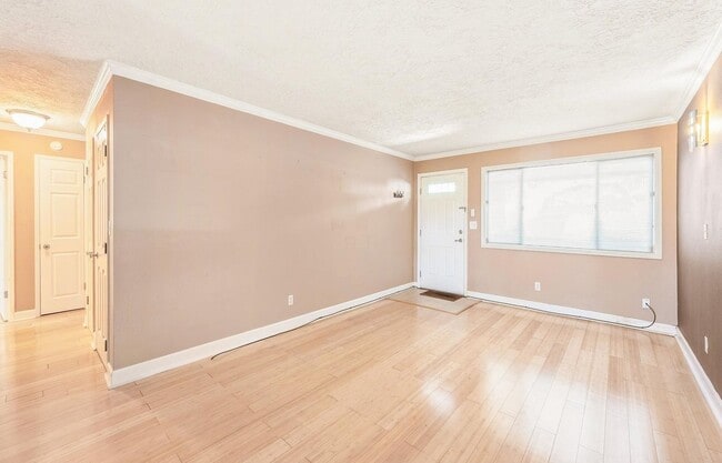 Photo - Spacious 2-Bedroom Condo with Forest Views, Private Balcony, In-Unit Laundry & Community Amenitie...