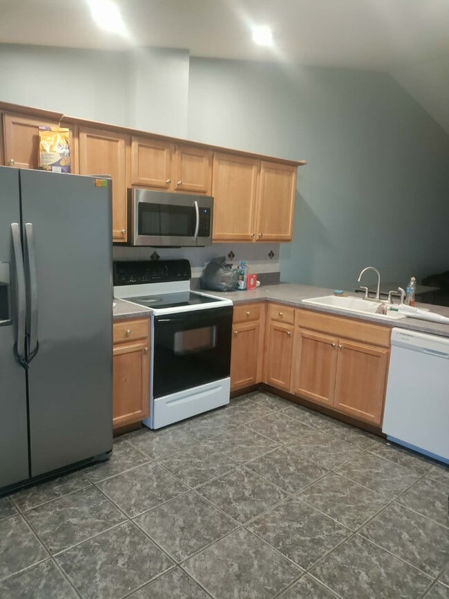 Kitchen open to dining/LR area - 3 Frank Pl