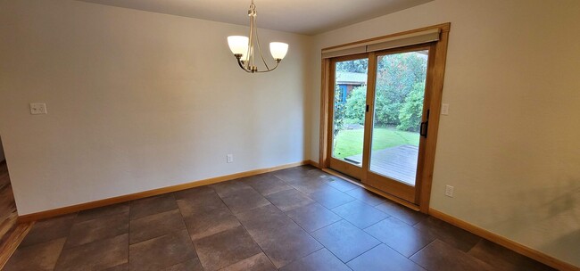 Photo - Gorgeous 4-bedroom home including a Two Car Garage and Spacious Backyard with a Shaded Patio