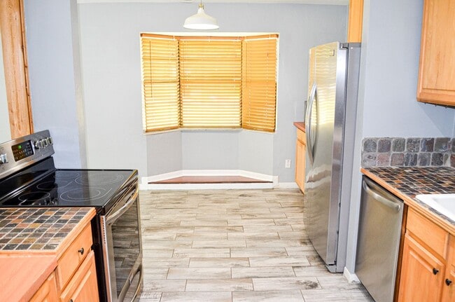 Photo - Check out this huge private fenced back yard at this Timberlane home!