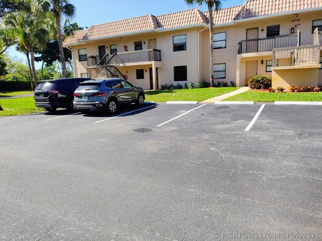 Building Photo - 6736 Palmetto Cir S Unit 102