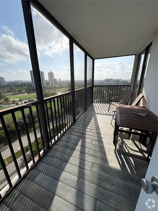 Building Photo - 3375 N Country Club Dr Unit 1406 Rental
