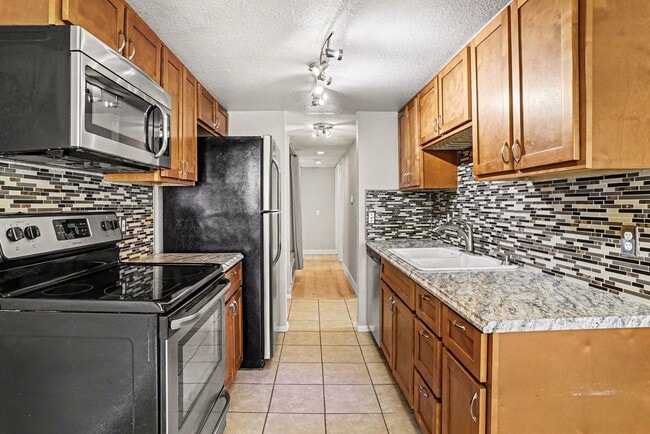 Building Photo - 9867 E Peakview Ave Unit E06