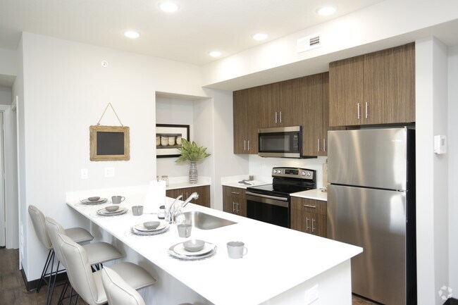 1 habitación, 1.5 baños - Pinehurst - 953 pies cuadrados - Fairway Flats