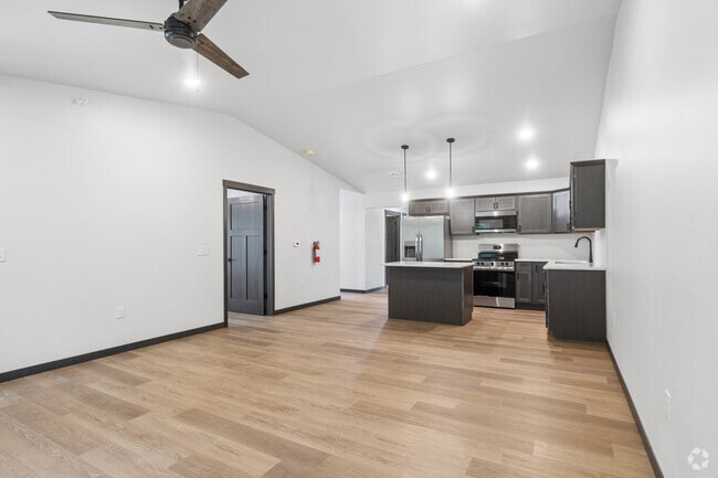 3BR, 2BA - 1,512SF - Living Room and Kitchen