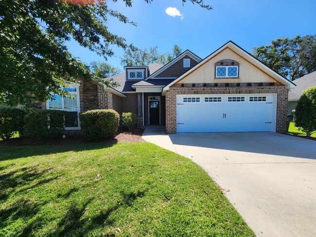 Building Photo - Spacious 4-Bedroom Home with Fenced Yard N...