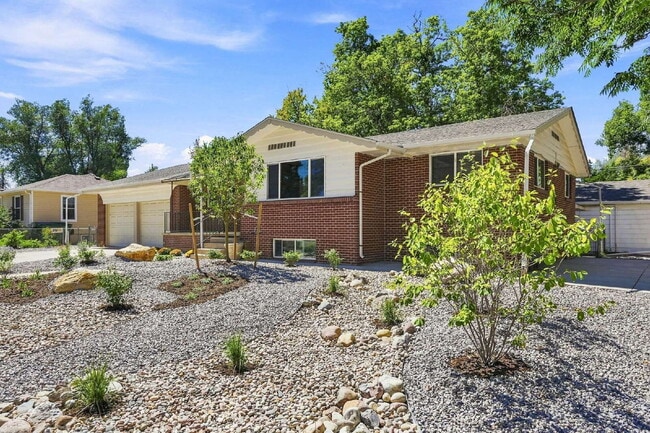 Photo - AVAILABLE NOW
Spacious 4-Bedroom Wheat Ridge Home with Finished Garden Level, Two-Car Garage & B...