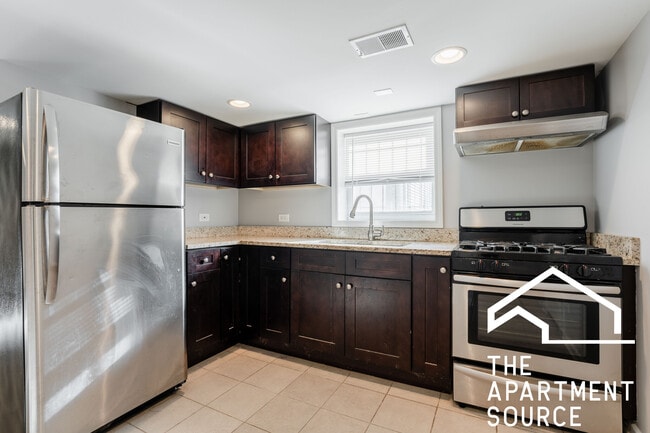 Building Photo - 2614 N Springfield Ave Unit GARDENREAR