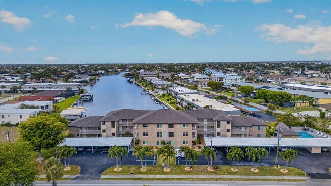 Building Photo - Gulf Access 2 bedroom 2 Bath Fully updated Condo with Water View