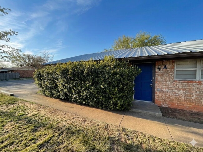 Building Photo - Updated South Lubbock Duplex — Spacious 2BD/1.5BA with Private Yard & Modern Finishes