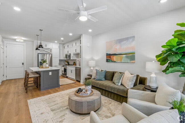 A1 1BR, 1BA - 922SF - Living Room & Kitchen - The Lodges of Huntersville