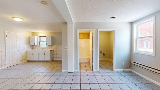 Building Photo - 7023 Clark Ave Unit Front Lower