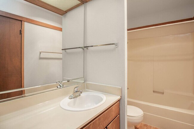Bright and Practical Bathroom at Mariposa Apartments