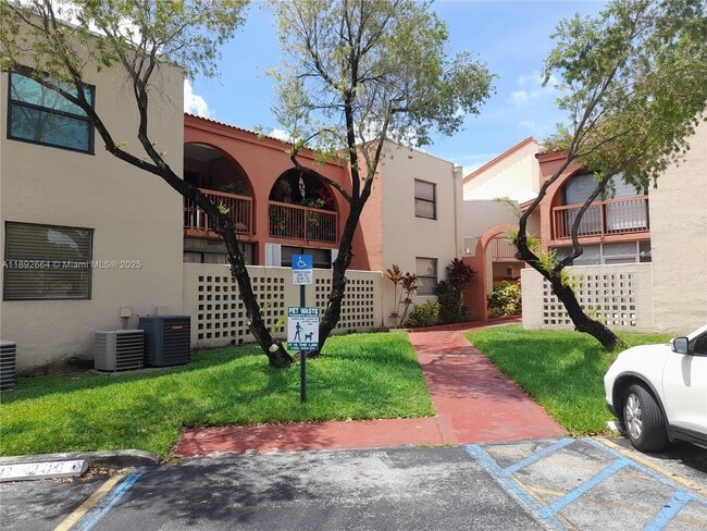 Building Photo - 10245 NW 9th St Cir Unit 204-9