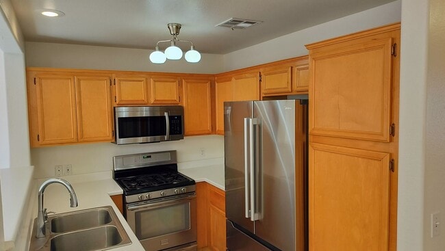 Photo - Townhome with Loft + Two Bedrooms/Baths - Designed for Comfort in Gated Community