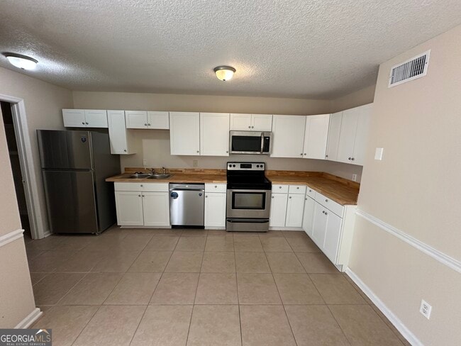 Photo - 129 Inlet Reach Cir Townhome