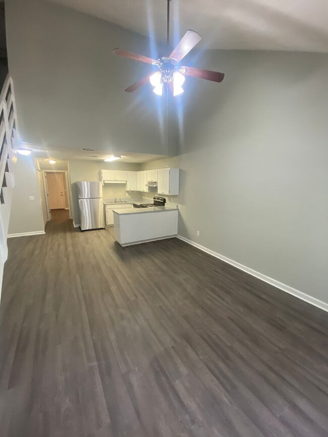 Freshly Remodeled 2 BR 2 BA Townhome Available Now! Beautiful New Flooring, Paint, And More!