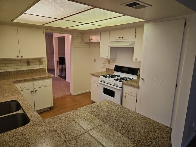 Photo - Spacious 4-Bedroom Home with Large Backyard & Covered Patio!