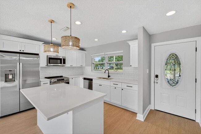 Photo - Fully Remodeled 3BR Home with Large Fenced Yard & New Deck