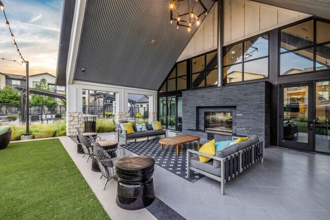 Outdoor Entertainment Lounge with Fireplace and TVs - 3Sixty Flats