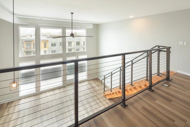 Enjoy floor-to-ceiling windows featured in our loft apartment homes. - Modera LoHi