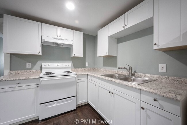 Photo - Charming 1-Bedroom Duplex with Modern Amen...