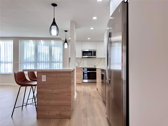 Building Photo - 10230 Collins Ave