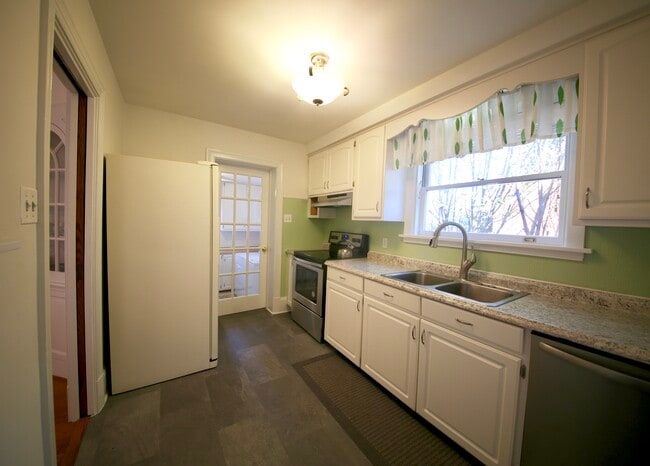 Laundry room off kitchen. - 2308 Buckingham Ave House