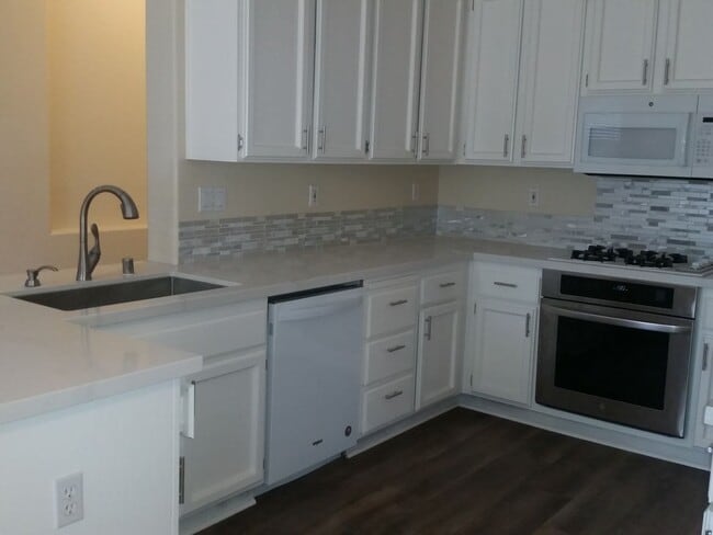 Photo - Spacious 4-Bedroom Home in a Great Neighborhood!