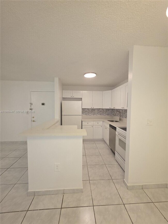 Photo - 823 NE 199th St Unit 104-12