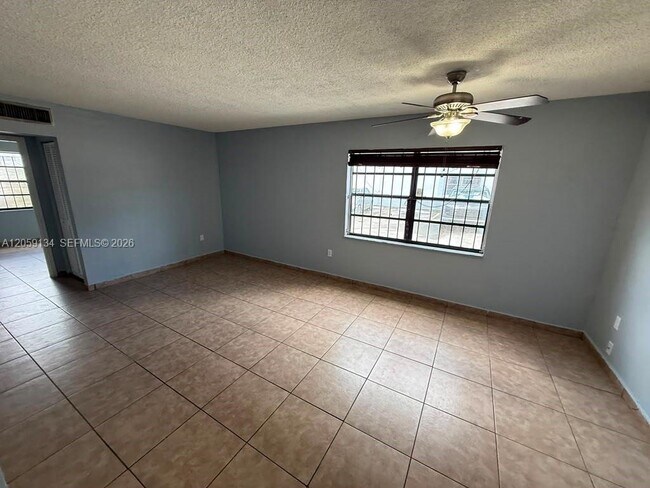 Photo - 1325 W 68th St Unit 111