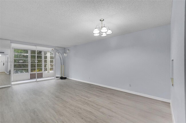 Building Photo - 5320 NW 11th St Unit 205