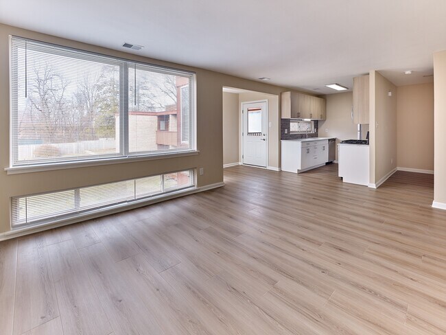 Bright and open 2 Bed,1 Bath with 908 sq. ft., oversized windows, and modern kitchen finishes.