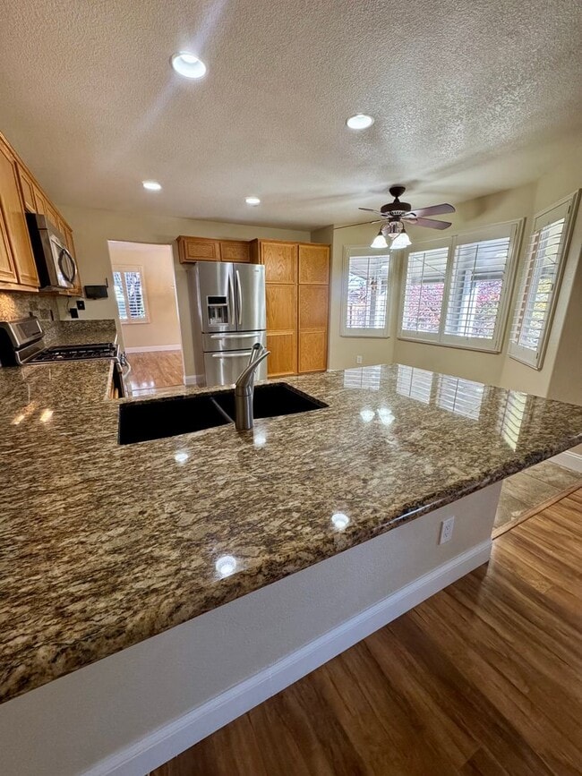 Photo - Inviting two-story 4BR/2.5BA home on nice lot with RV/trailer parking in Galena Terrace Estates!